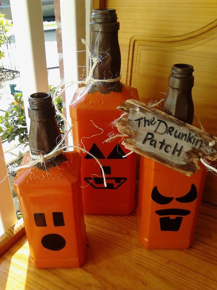 My spin on the wine bottle pumpkin- made from 3 different sizes of Jack Daniels ...