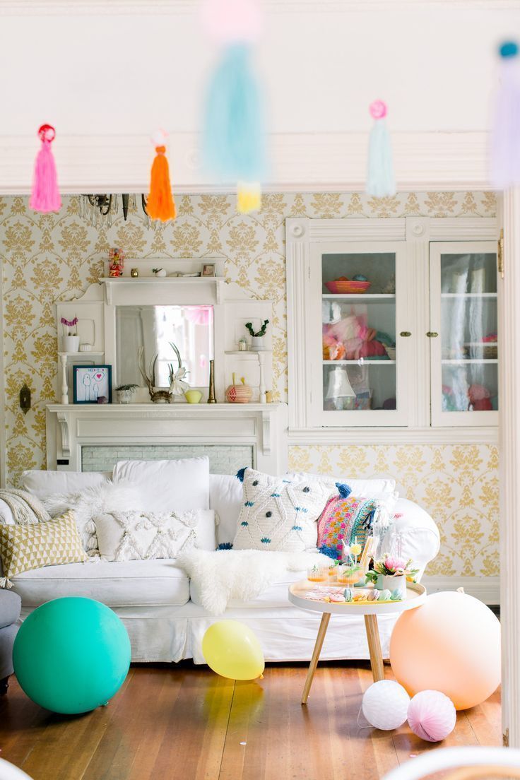 Nothing says happniess quite like throwing a Colorful Pom Pom Birthday Party ful...