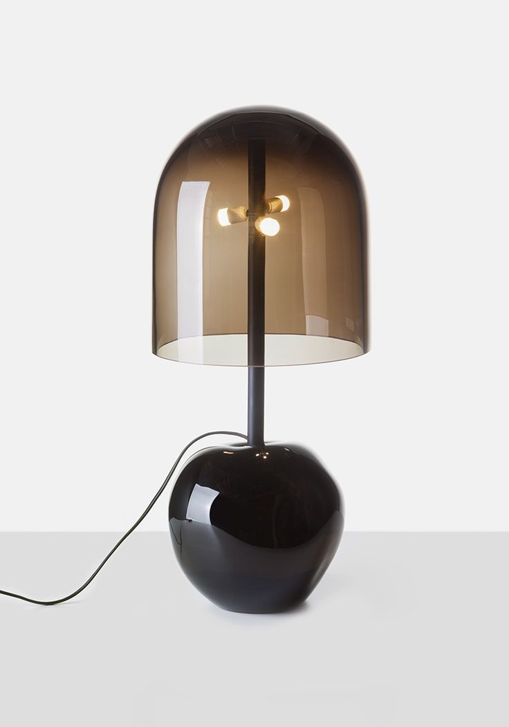 Antimatter floor lamp features a black glass base and a sanded glass shade in s...