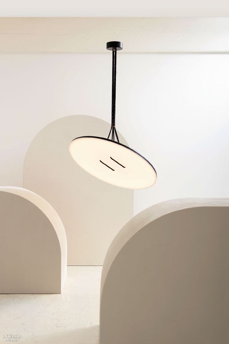 Cute as a Button, this LED pendant boasts a high-tension nylon rope suspension...
