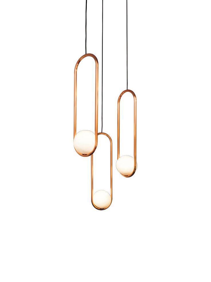 Mila pendant fixtures in brushed copper and handblown glass by Matthew McCormic...