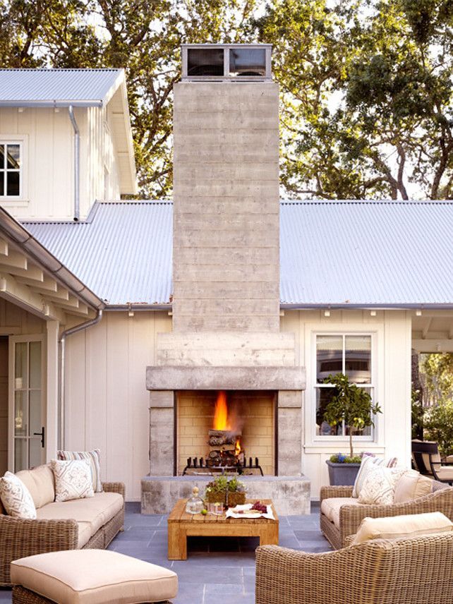 Patio with outdoor fireplace. Great patio with outdoor fireplace. I love the blu...