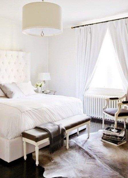 The grand, white bedroom