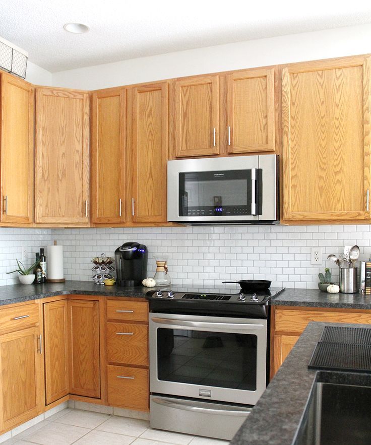 12 Ways to Decorate Above Kitchen Cabinets #kitchendecor #homeDIY #budgetDIY