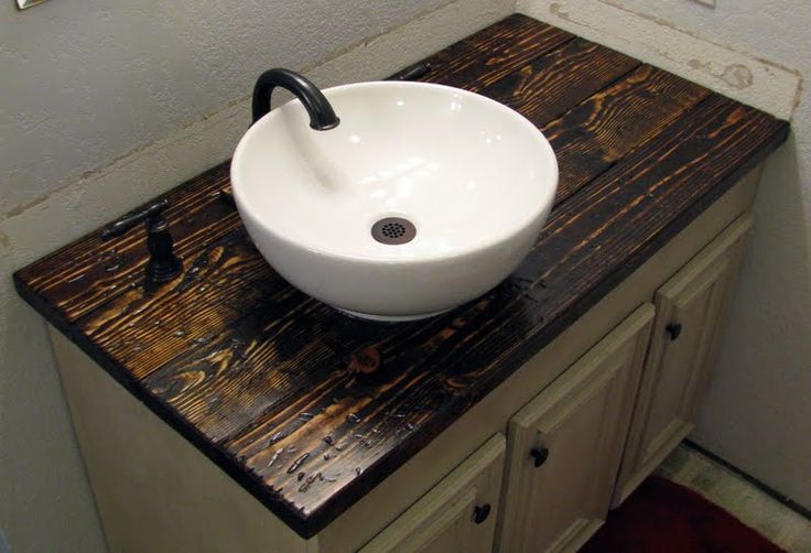 Bathroom vanity...and I love this wooden countertop!