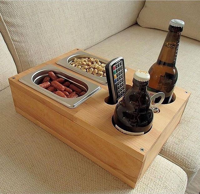 wooden box for serving drinks and snack on the sofa. Also holds the remote.