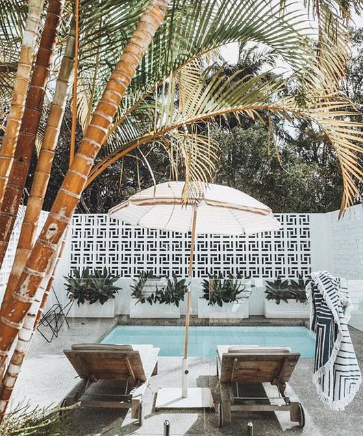 poolside tilework and palm trees. / sfgirlbybay