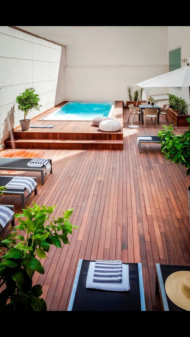 rised pool, wooden patio