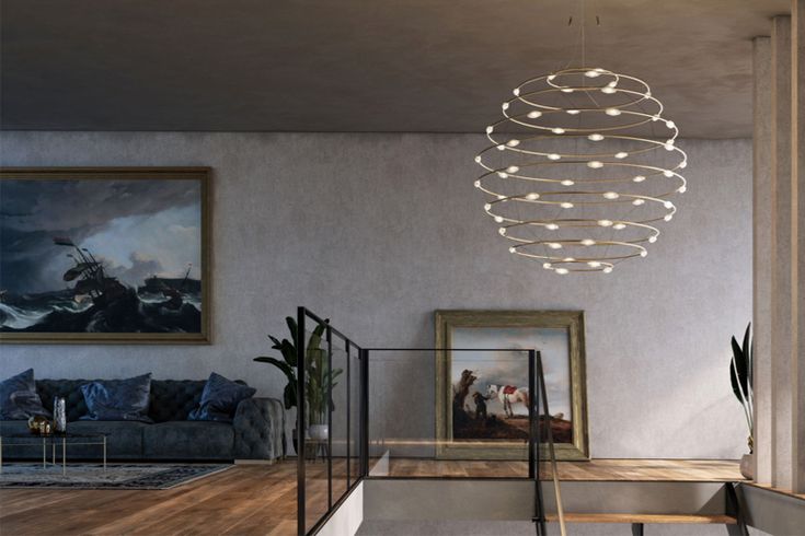A small galaxy is rendered in LEDs and brass with the spherical Petits Bijoux pe...