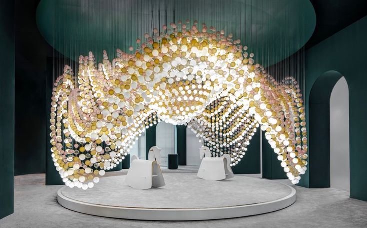 Drawing crowds of mesmerized onlookers, installation Carousel of Light by Precio...