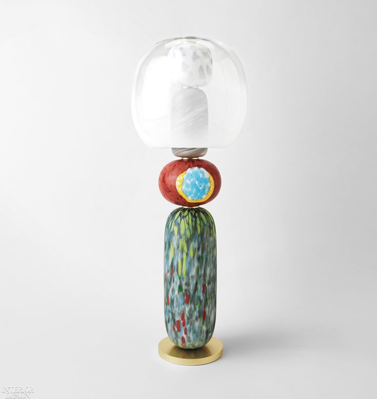 Fusa, a totemic lamp series was developed by cutting and layering Josef Frank fa...