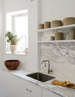 50 Kitchen Backsplash Designs from @Dwell! My fave is the marble slab backsplash...