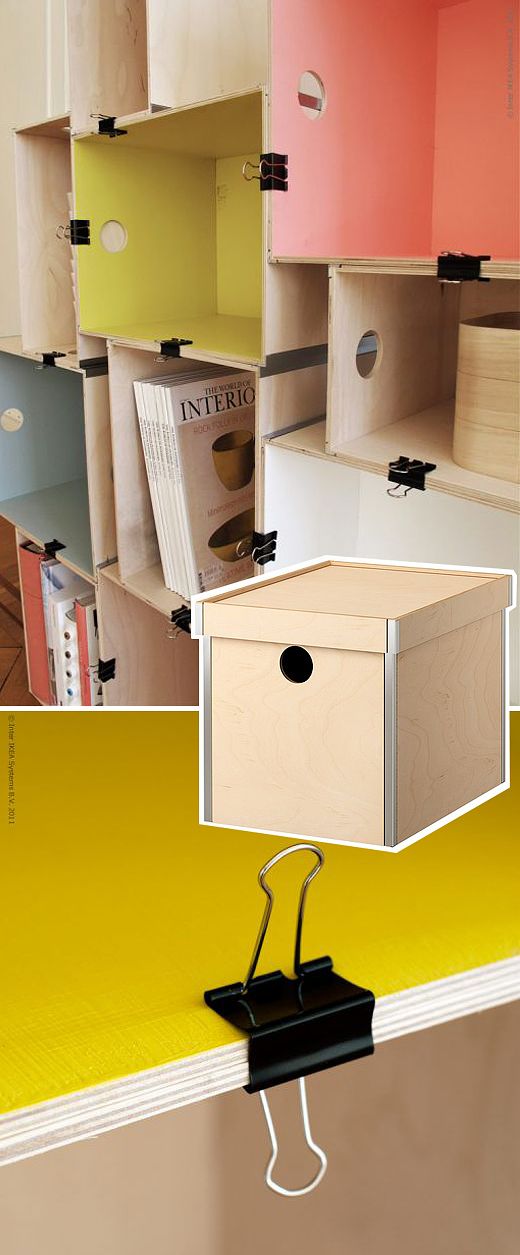 a bookcase made ​​of IKEA's boxes and binder clips