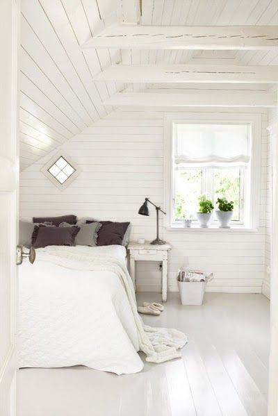 Loving this room! Lots of white and wood paneling. Cute little diamond-shaped wi...