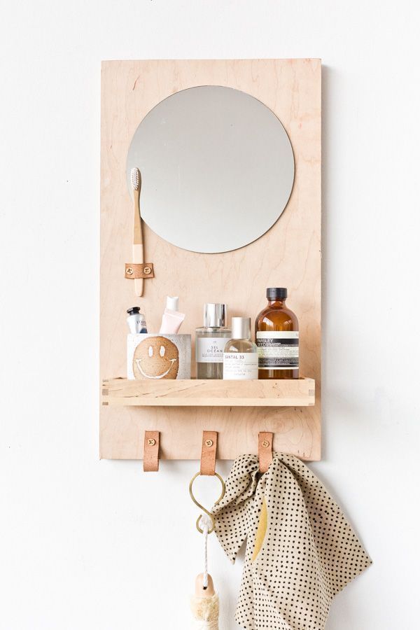 Learn how to make a modern DIY bathroom organizer (with mirror) out of scrap ply...