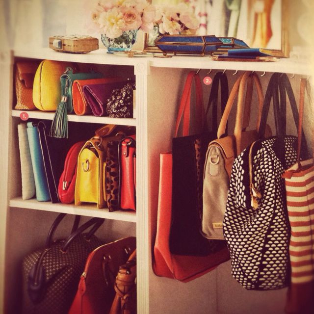 Love this small space trick - use hooks to hang and store handbags. Super clever...