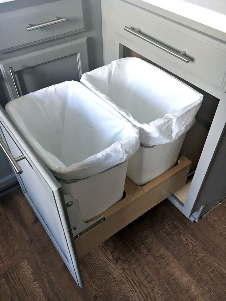 organize with pull out trash and recycle bins