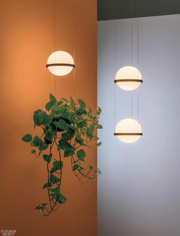 Antoni Arola’s Palma dimmable LED pendants in blown opal glass with aluminum r...