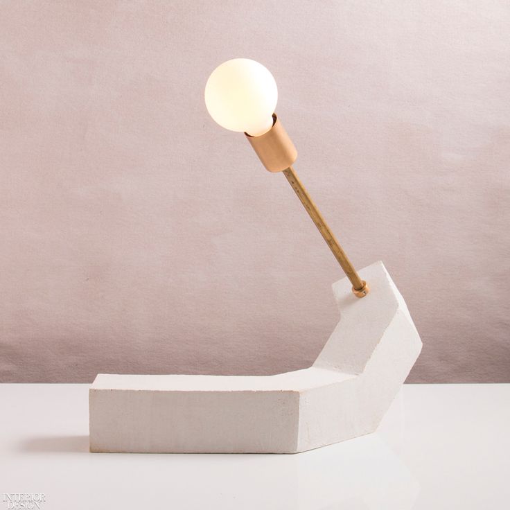 Conduit Incline table lamp in stoneware and brass by John Sheppard.