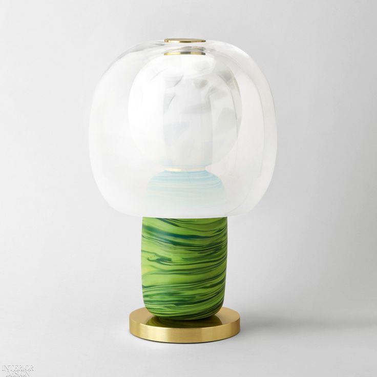 Fusa, a totemic lamp series was developed by cutting and layering Josef Frank fa...