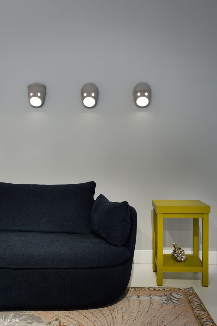 Glenn, Ted, and Bert sconces in ceramic and aluminum by Moooi.