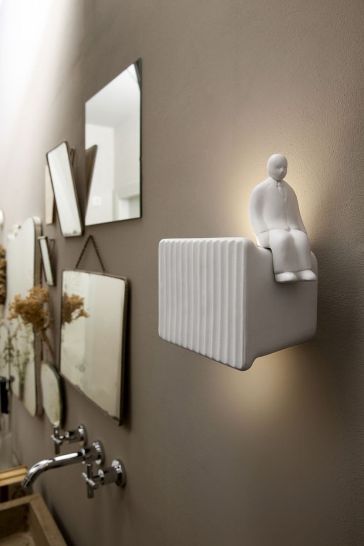 Italian lighting company KARMAN, has released Umarell, a fun wall lamp that was ...