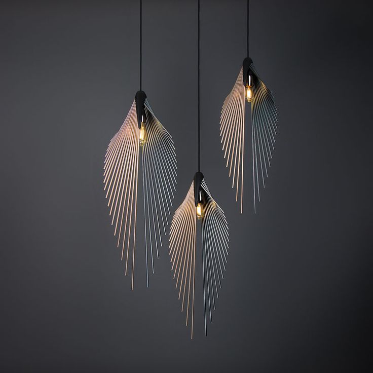 This modern pendant light's shape is defined by the anodized aluminium poles, fi...