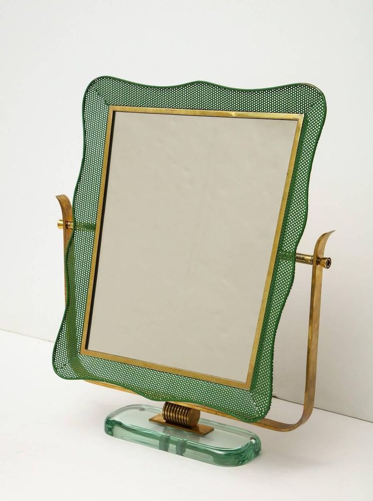 Fantastic tabletop mirror.  Brass structure with swivel mechanism, thick glass b...