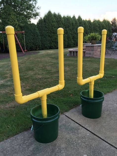 These DIY football posts would make a great backyard game for the summer. A litt...