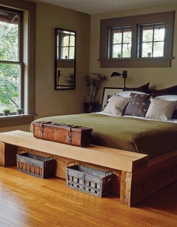 love the bench at the foot of the bed & the boxes.
