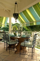 Barry Dixon, St. Barts dining porch - love the colorful deep awnings, trestle ta...