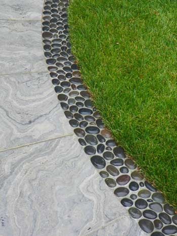 Edging - just stick polished rocks in concrete.