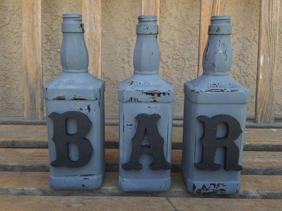 Decorated jack daniels bottles. Bar decor. Decorated bottles. Jack daniels decor