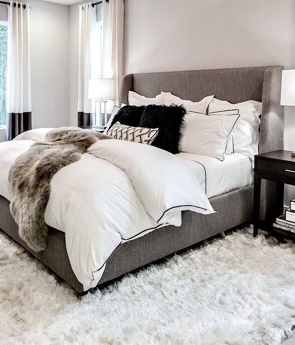 White and gray cozy bedroom.