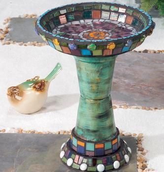 Look closely at this mosaic birdbath: that's two terracotta pots and two ter...