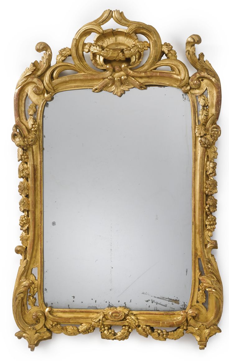 A Louis XV/XVI transitional carved giltwood mirror circa 1765 the frame carved w...