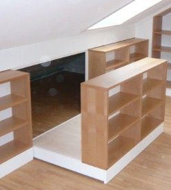 hidden storage behind bookcase in room with slanted walls, great idea!great for ...