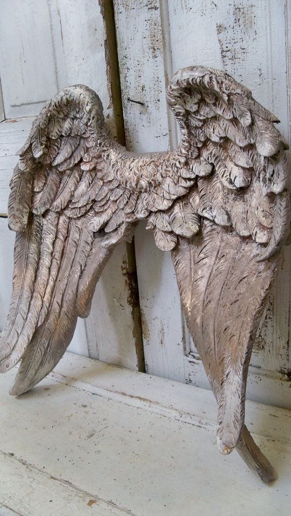 Large angel wings wall sculpture hand painted putty gray, white and gold ornate detailed feathered wall decor Anita Spero