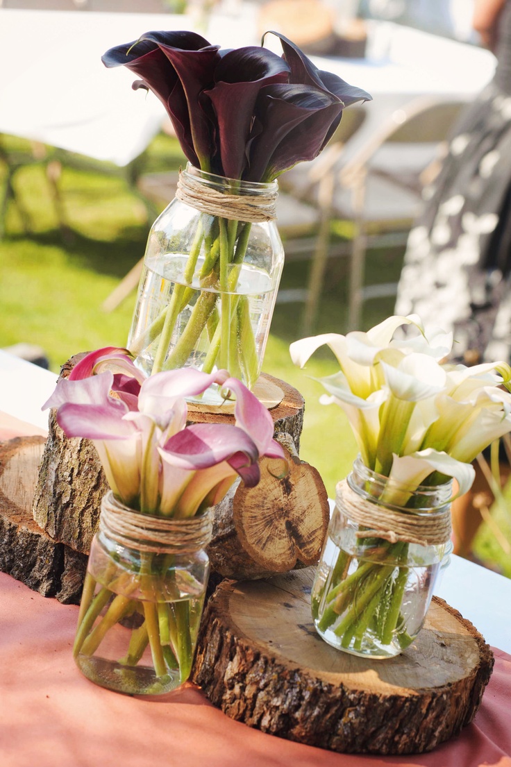 Simple centerpieces- change the flowers to hydrangea and peonies. Wood, mason ja...