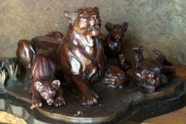 'Savannah Siesta (Small Lioness and Cubs statue)' by Michael J Mawdsley