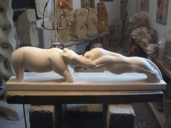 'Lioness and Baby Rhino (Stylised Fighting statue)' by Nicholas Rowsell