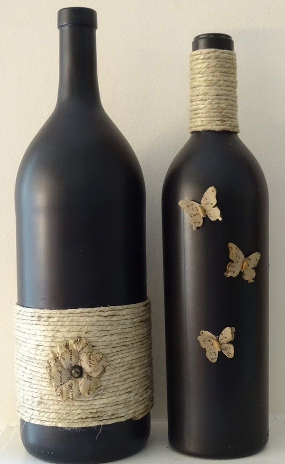 Items similar to Black painted wine bottle with twine and butterflies on Etsy