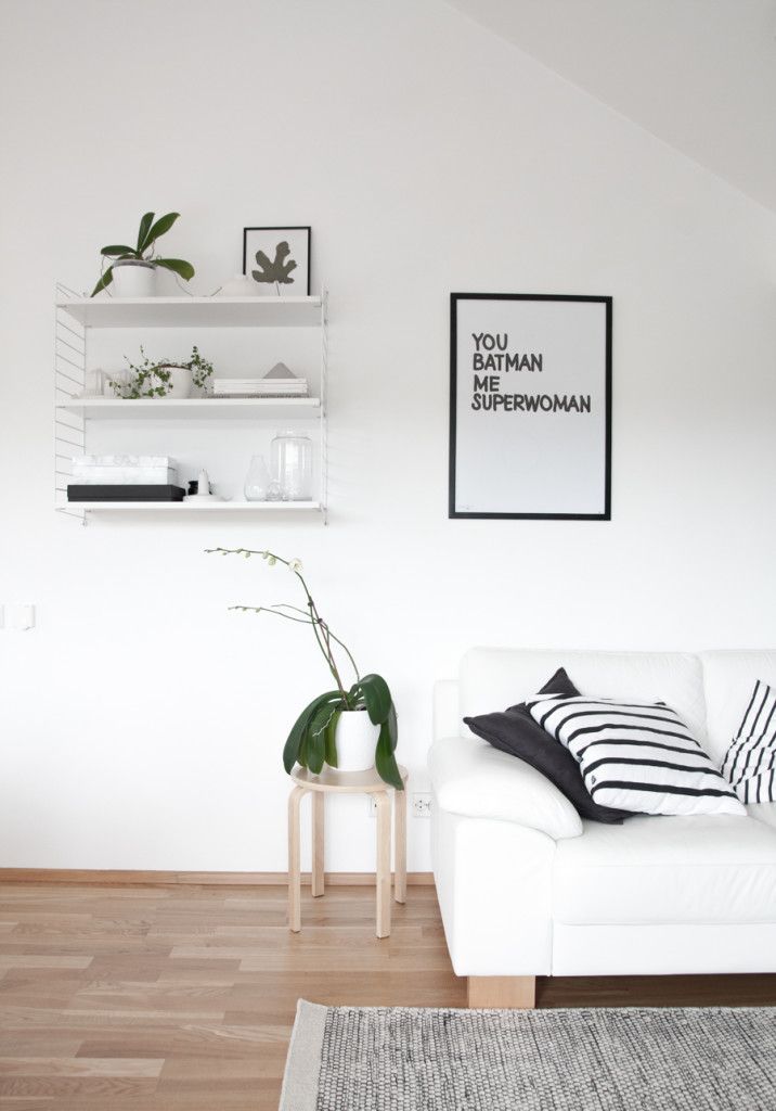 Scandinavian living room. White walls, white sofa, String shelf. from Decordots ...