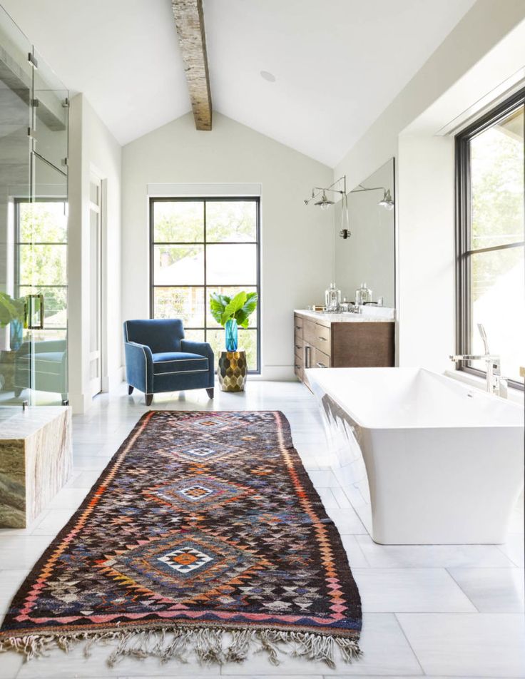 Large pattern runner rug in bathroom design | Tatum Brown Custom Homes