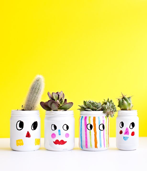 KID-MADE FUNNY FACES PAINTED PLANT JARS