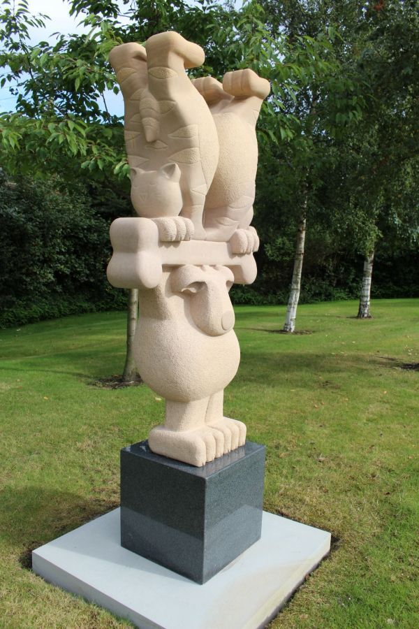 #Stone #granite #sculpture by #sculptor Michael Disley titled: 'Dog Training (ab...