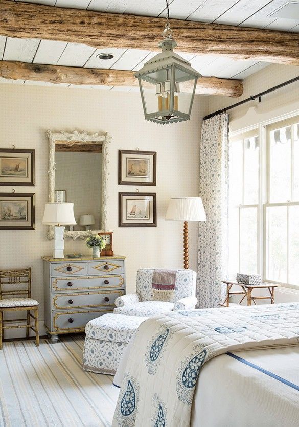 Rustic Bedroom | Whitewashed wood floors and ceiling, paired with light gray fur...