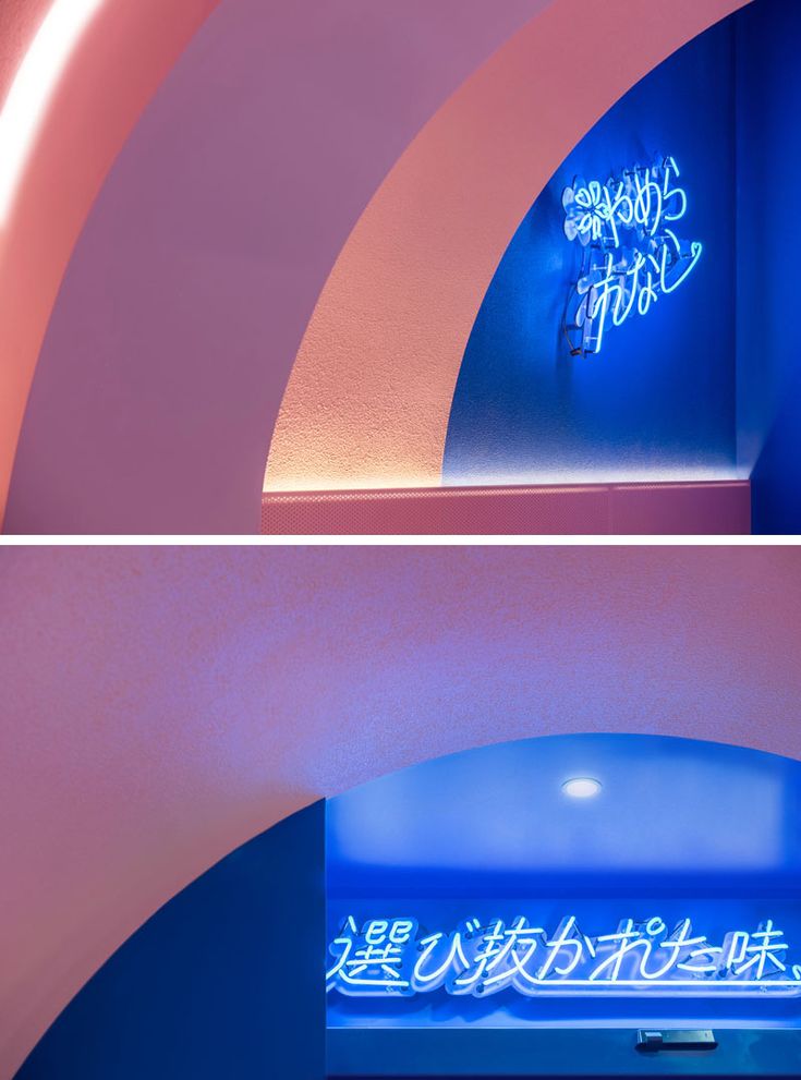 In this modern ramen restaurant, neon signs have been used to create focal point...