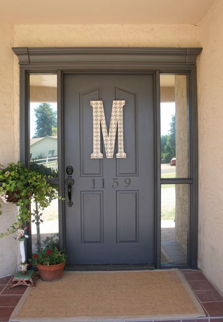 Add molding to the top of the front door to create a totally custom look