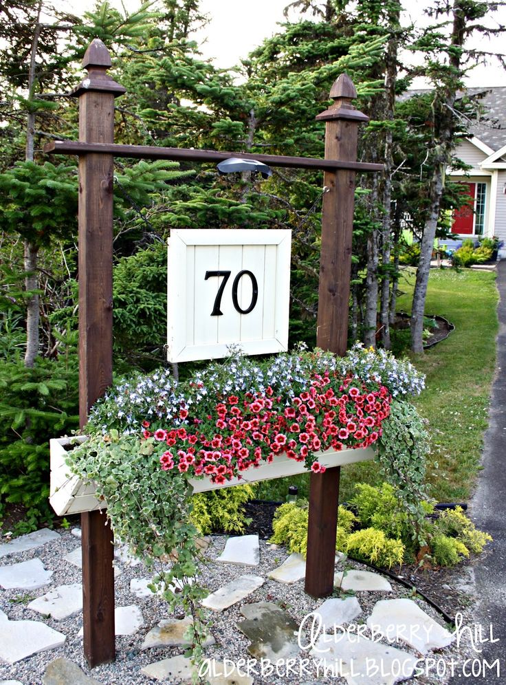 Number sign with built in planter (and solar light) for the end of the driveway....